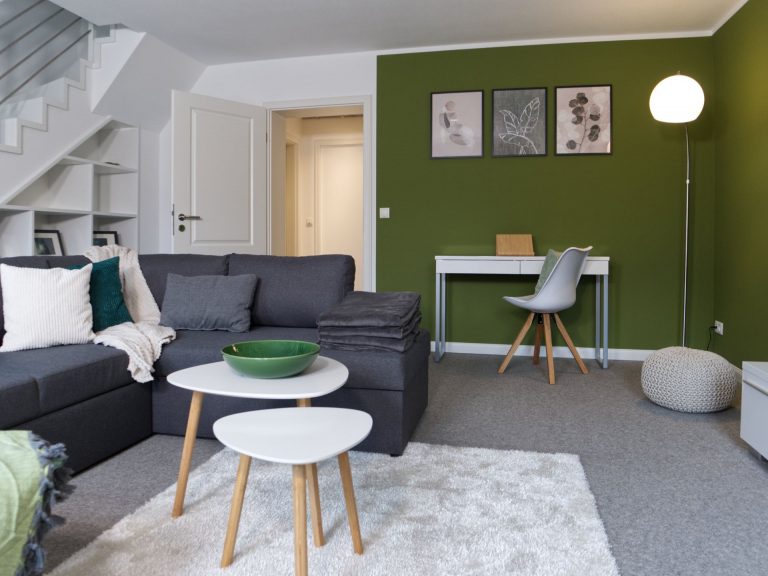 Gemütlich eingerichtetes Wohnzimmer im Apartment Boulevard XXL.